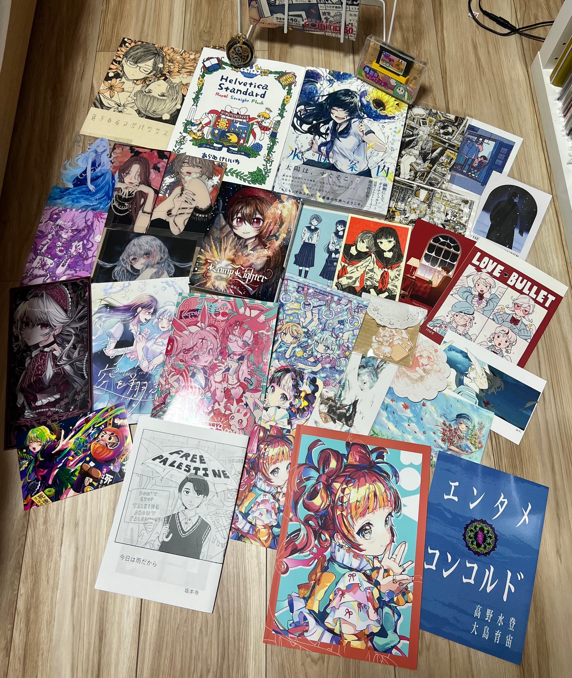 collection of items purchased at COMITIA 150