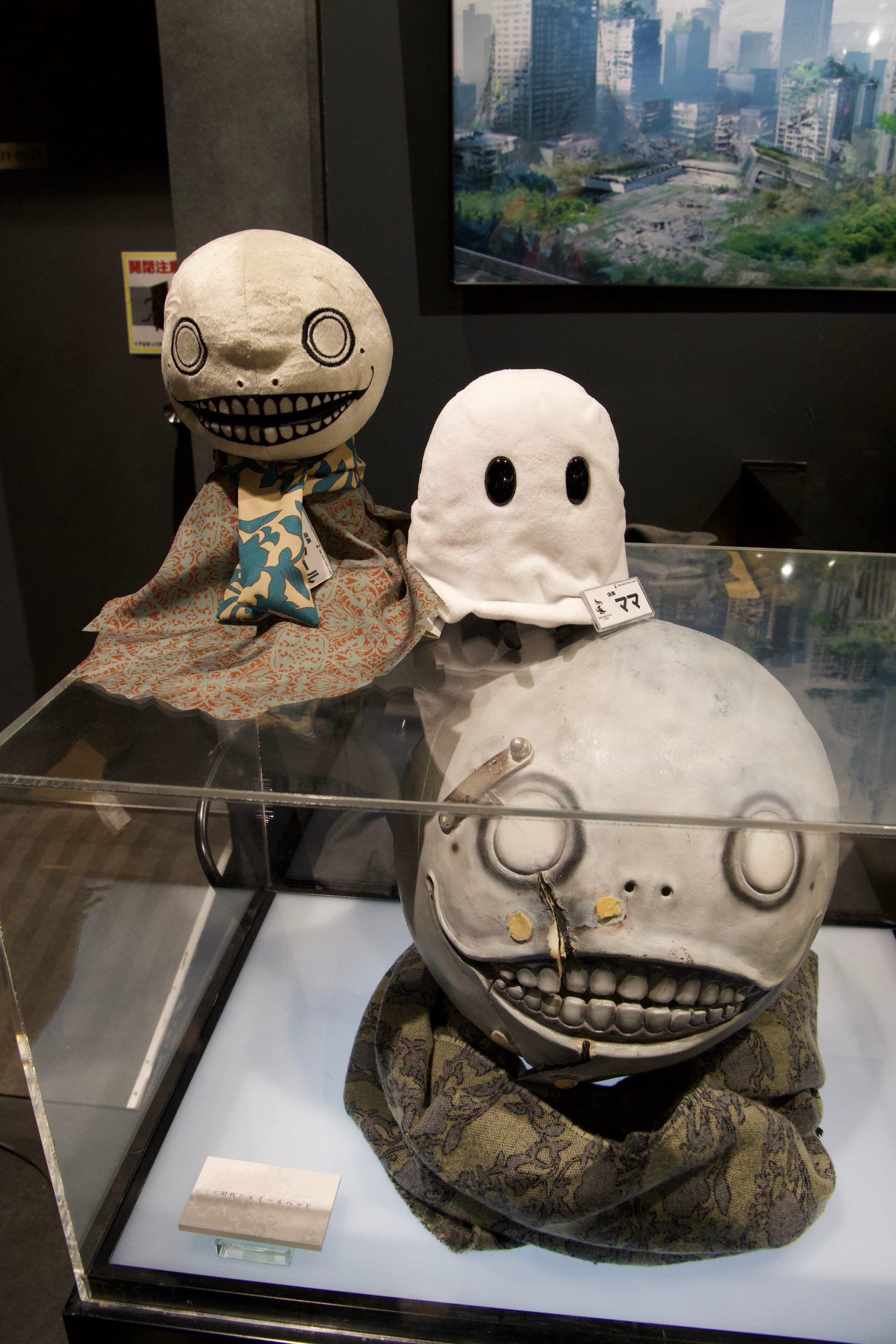 Yoko Taro's mask on display at Square Enix Cafe