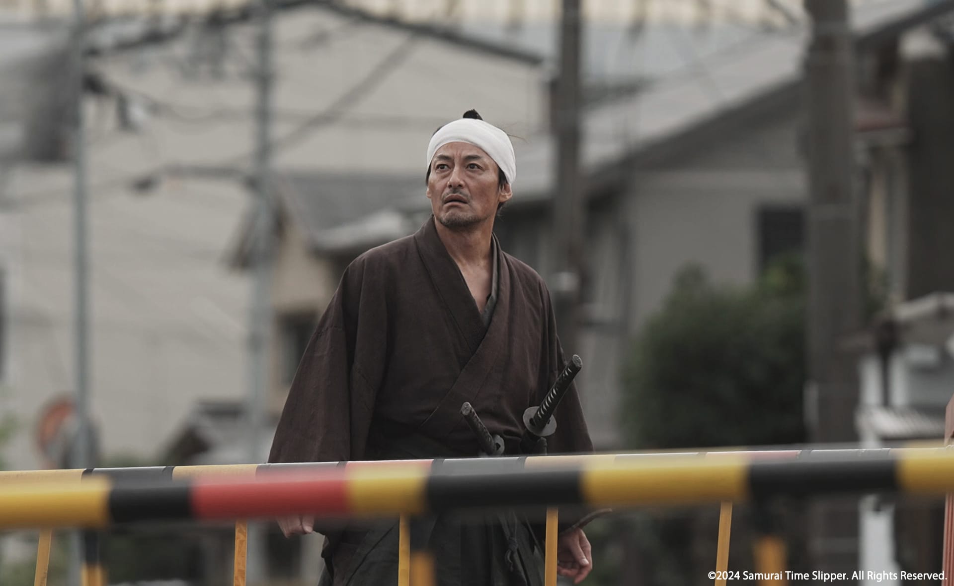 Samurai at a train crossing in A Samurai in Time