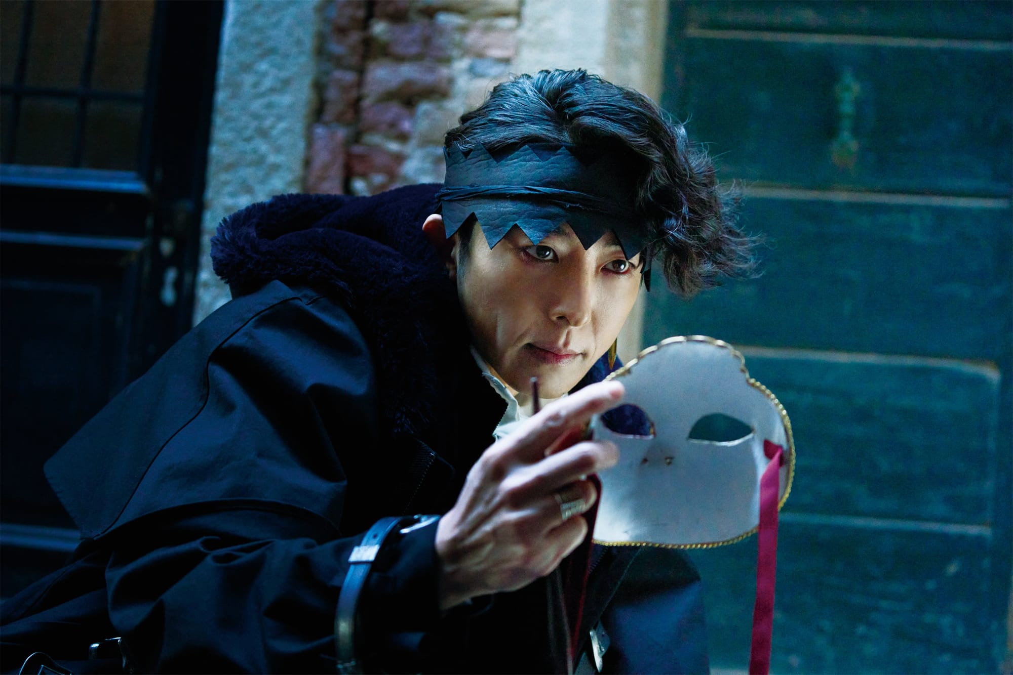 Rohan Kishibe (Issey Takahashi) finds a mask in At a Confessional film