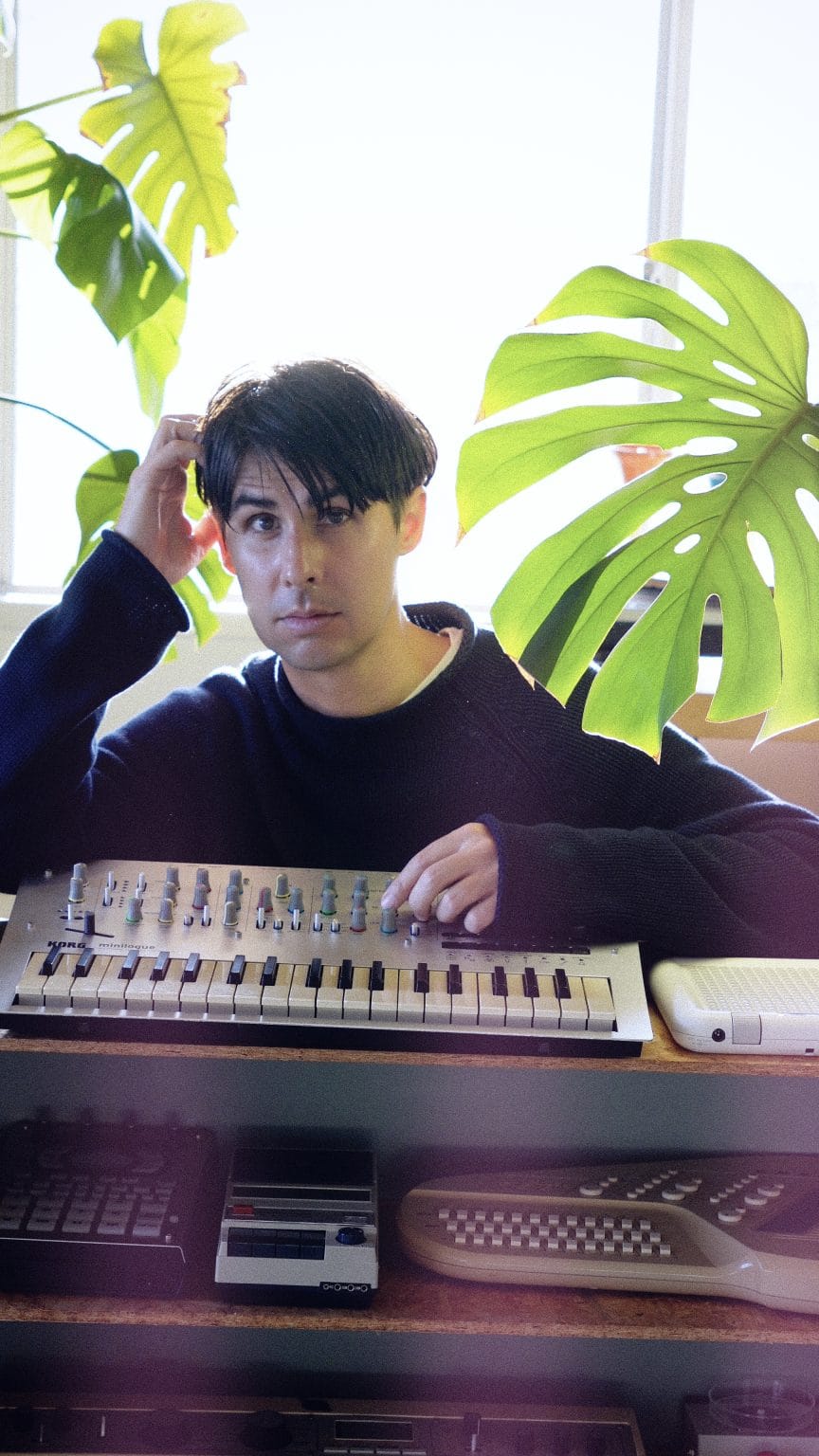 Lullatone with a collection of music hardware