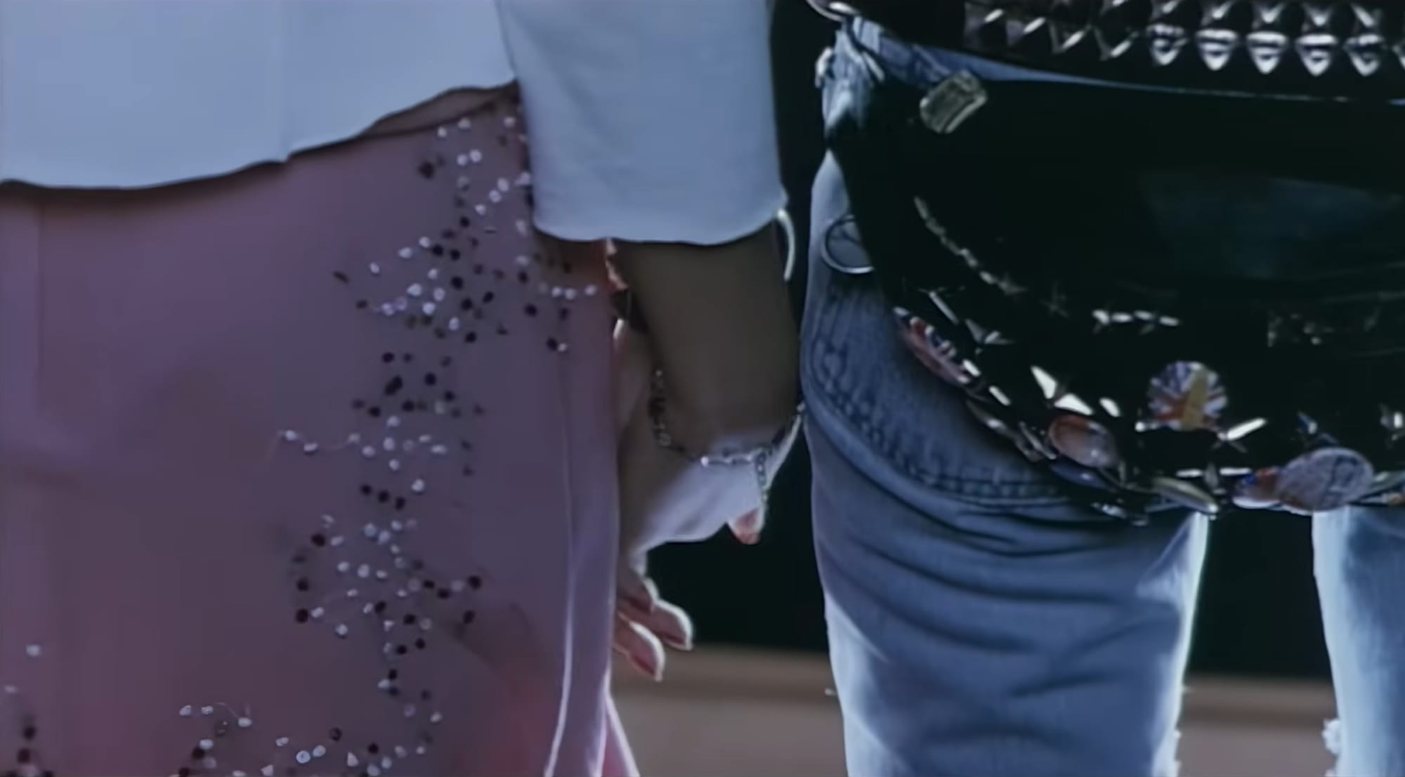 the two Nana's hold hands