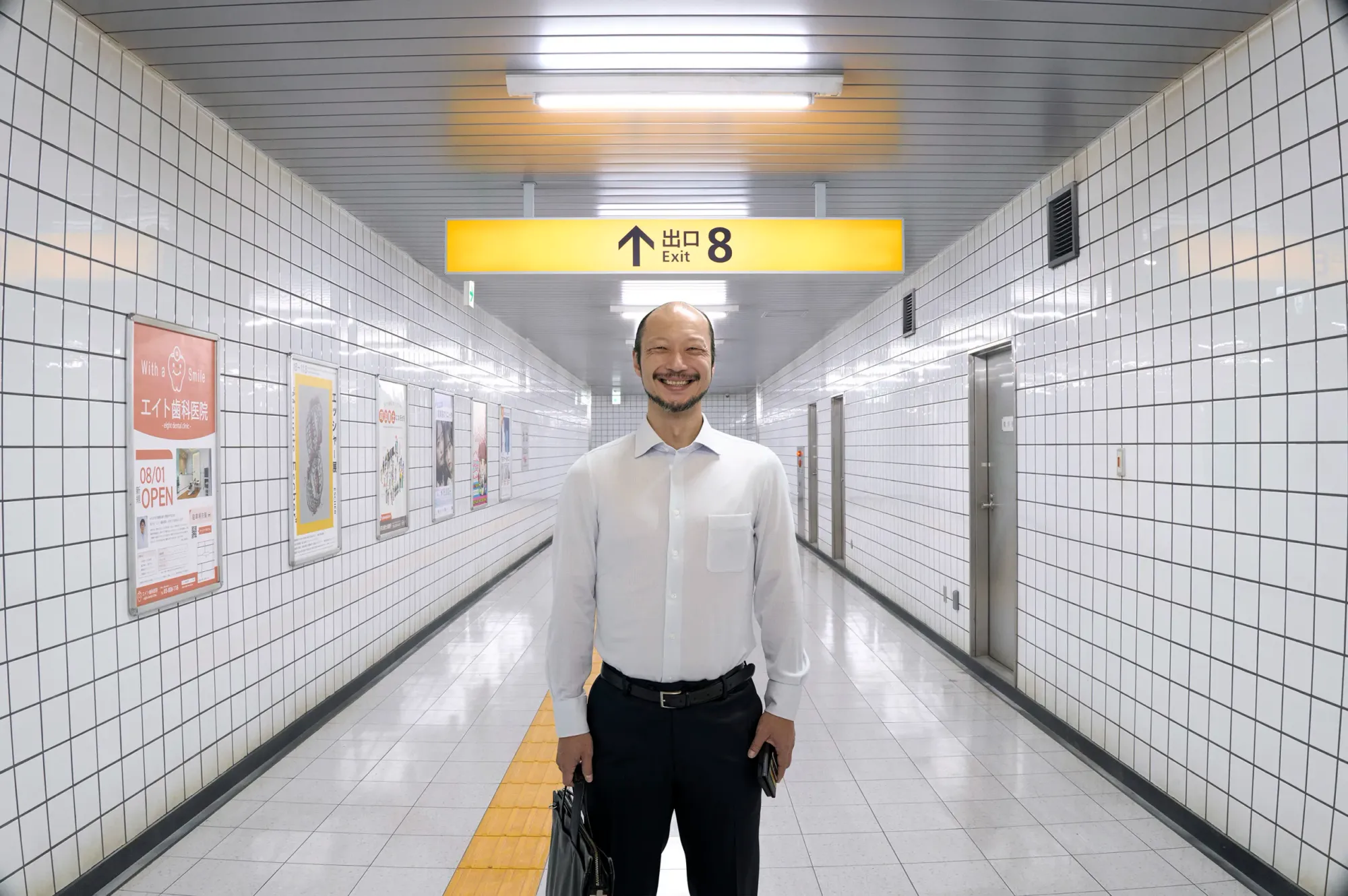 Yamato Kochi as the walking man in Exit 8