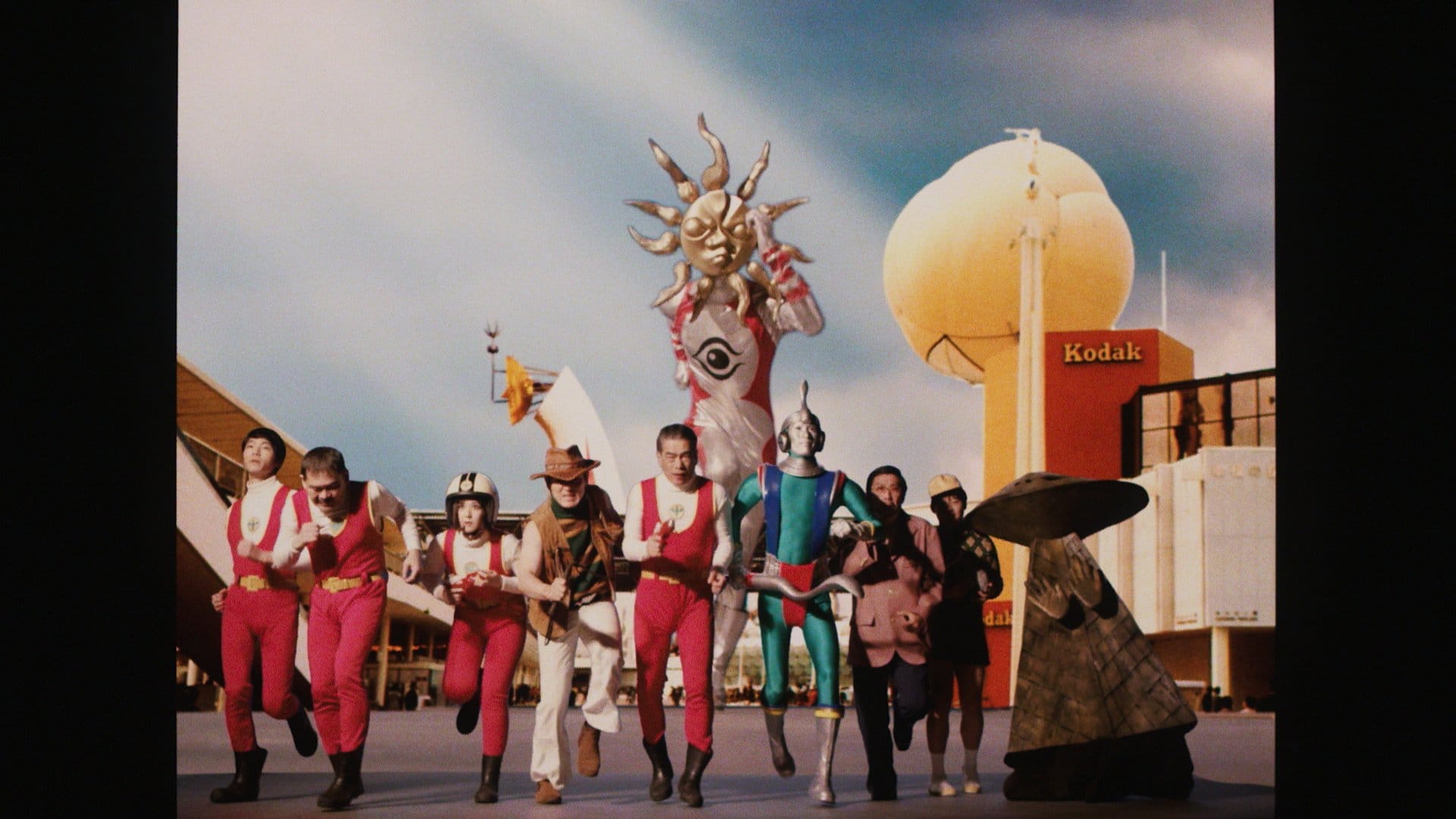 People & Taroman running toward the frame