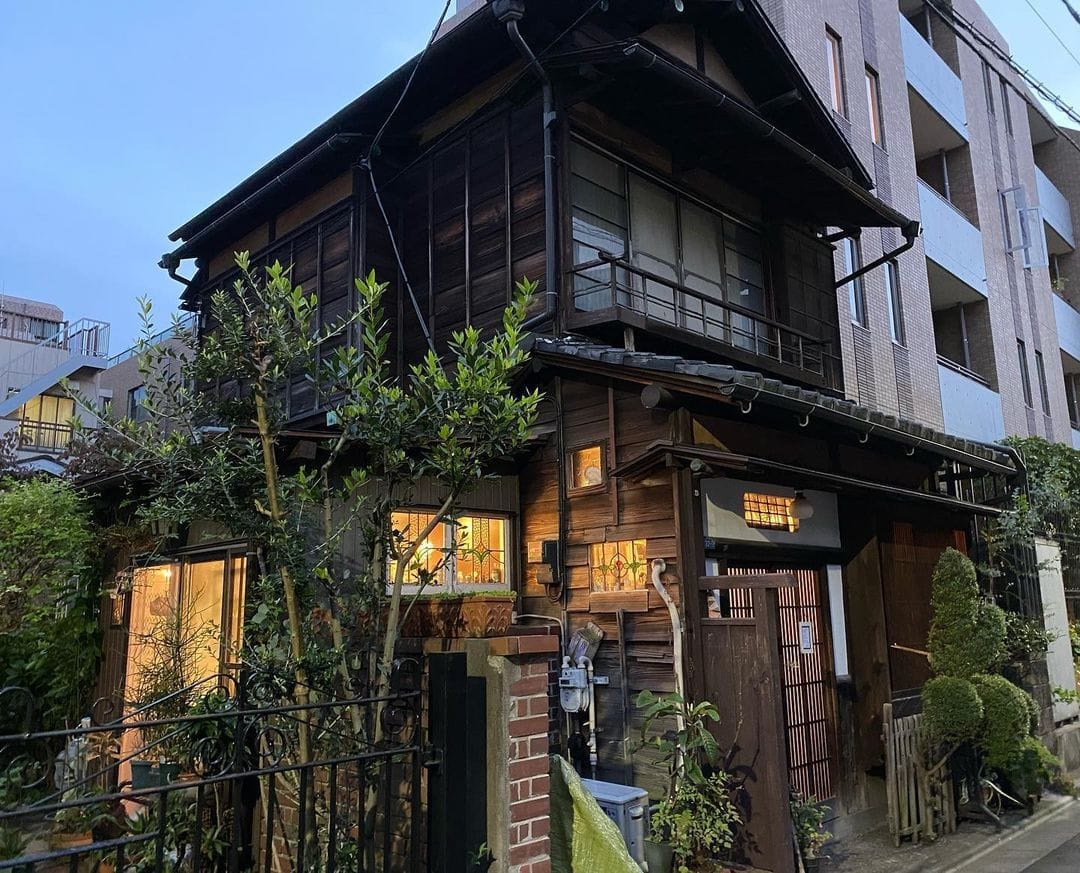 View of a traditional wooden Japanese house with stained glass decoration in the windows
