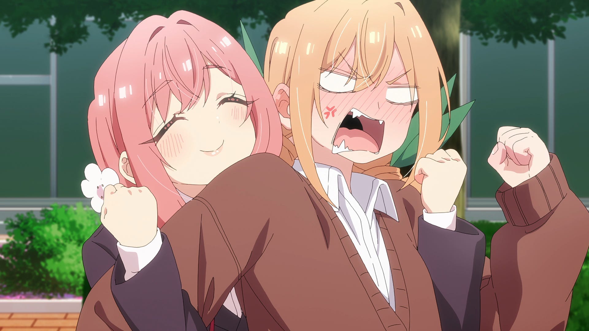 Hakari (left) tries to hold back an angry Karane (right). 