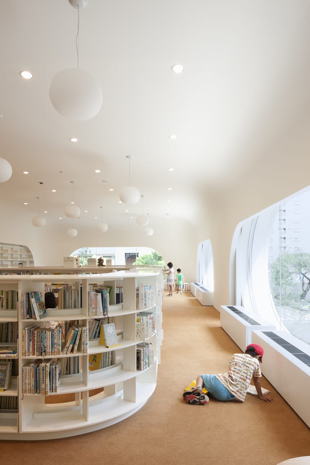 child reading a book at Musashino Place