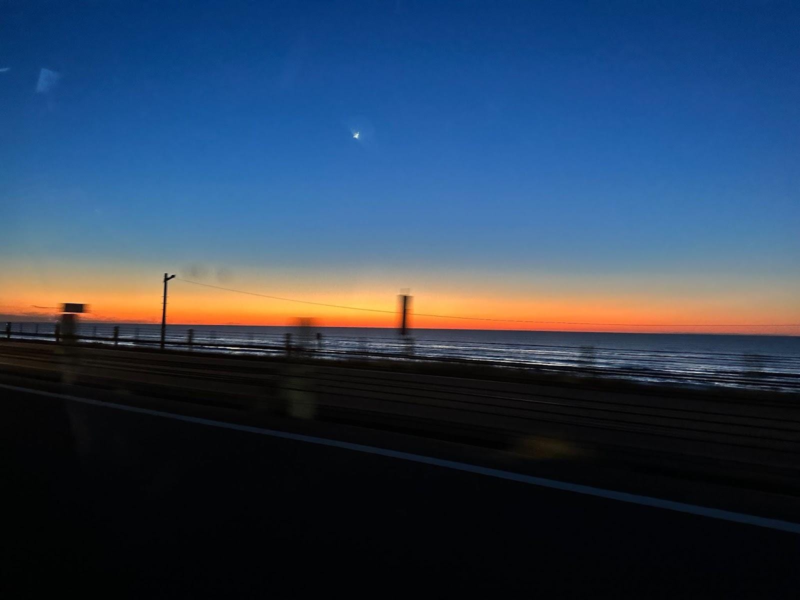 November 2024, sunset on the Noto Satoyama Kaidou, the road that connects Kanazawa to Noto. Photo by the author