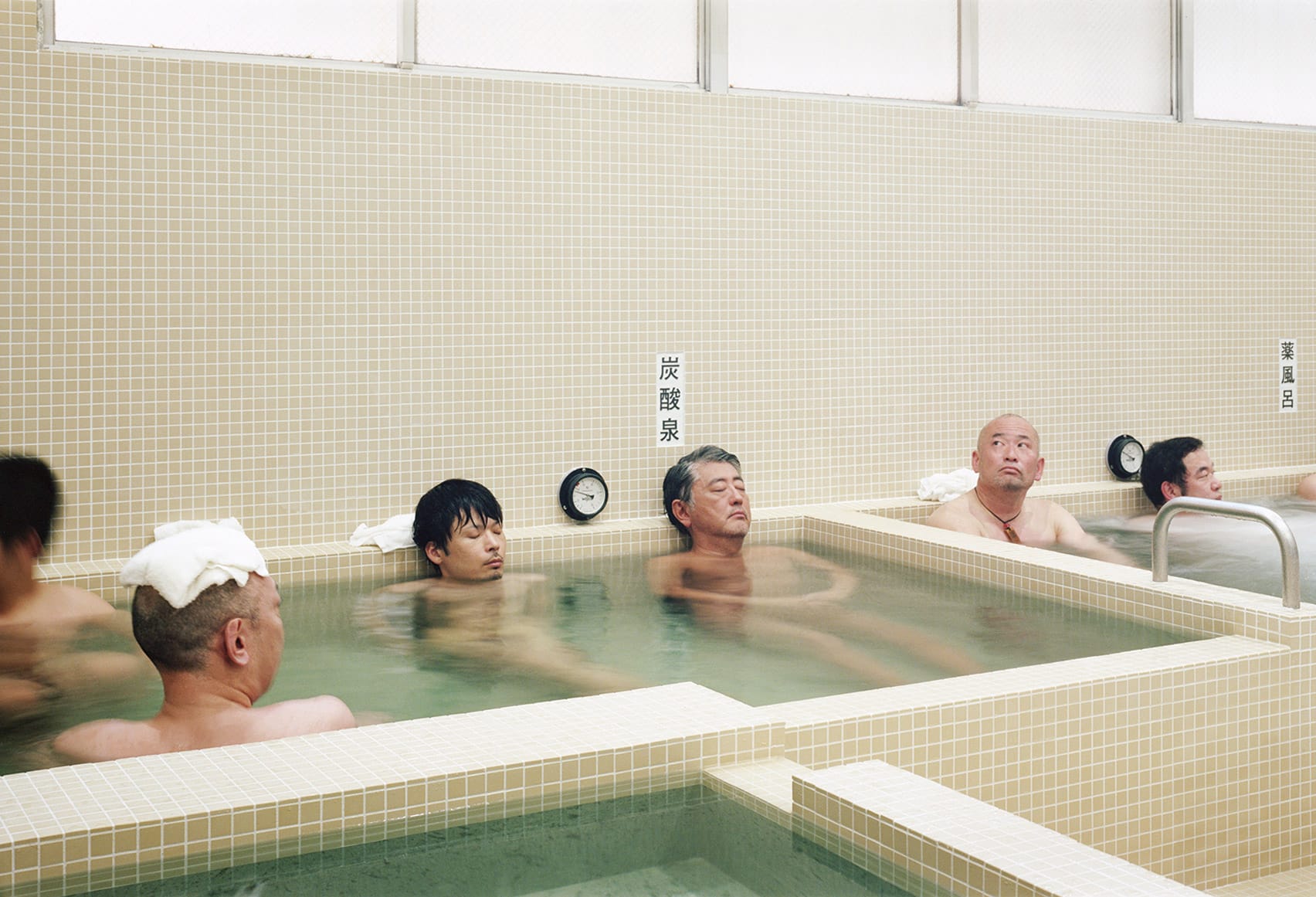 Men bathing in a Japanese sento