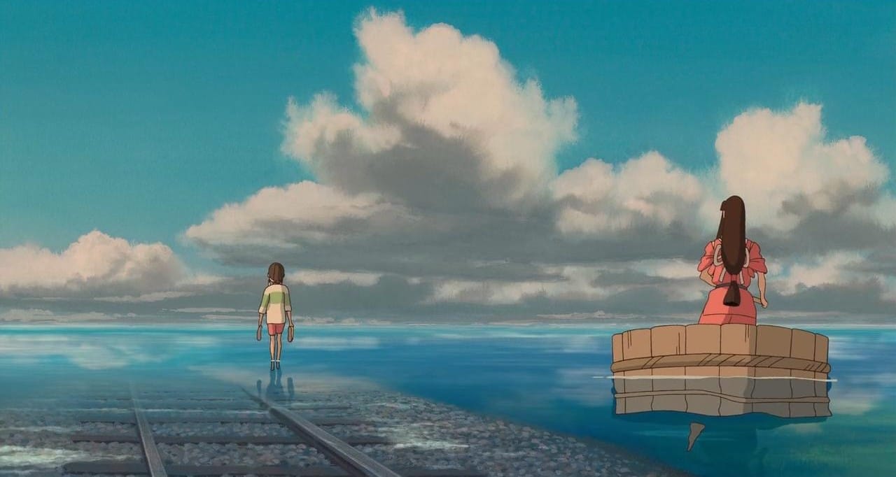 spirited away chihiro and lin on the watery train tracks.