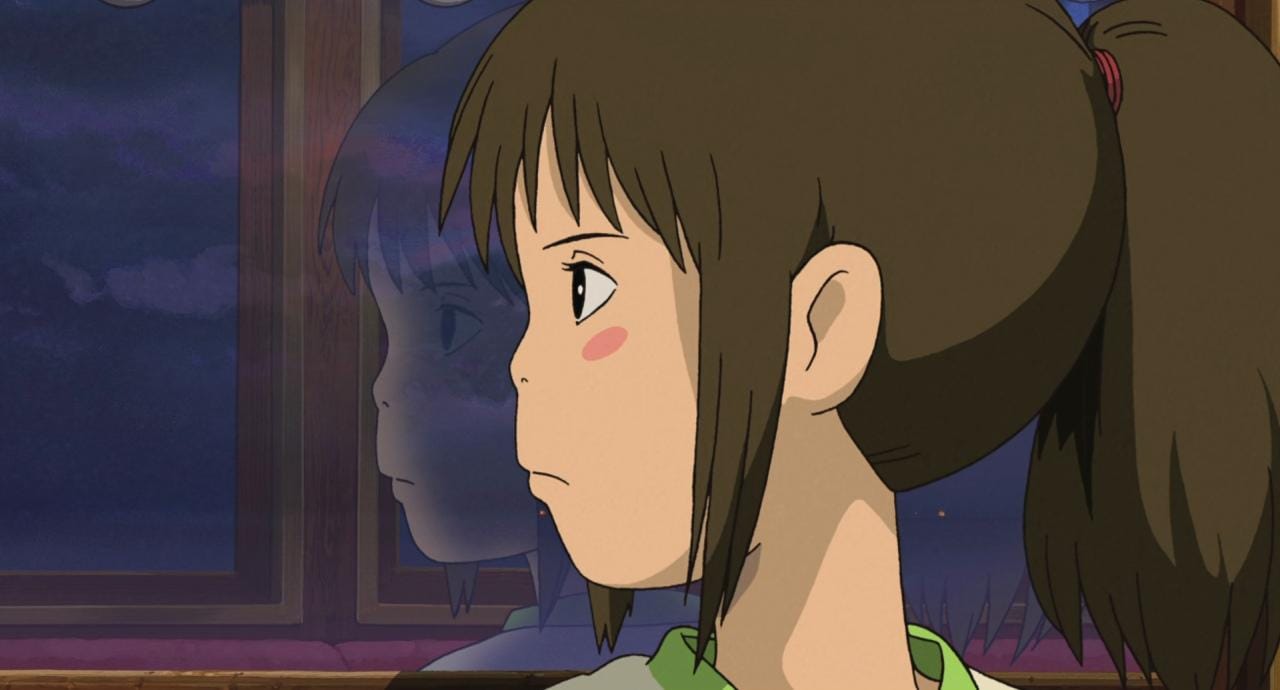 spirited away chihiro with a serious gaze.